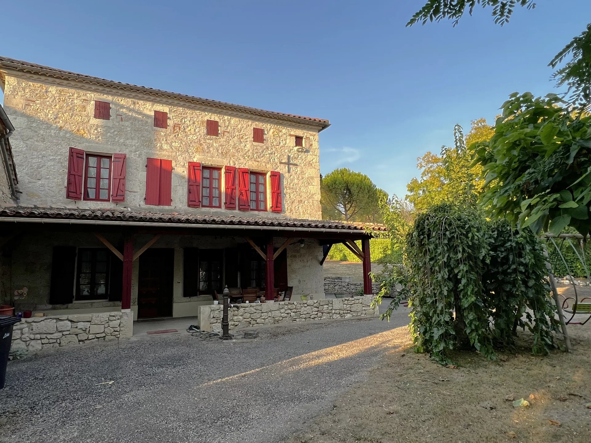 Stone village house with barn and attractive grounds