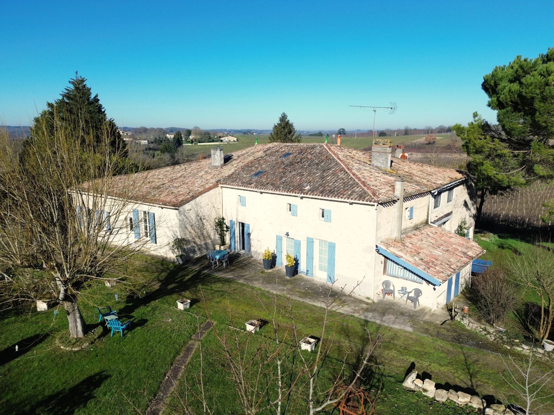 Stone building complex of 3 units with swimming pool
