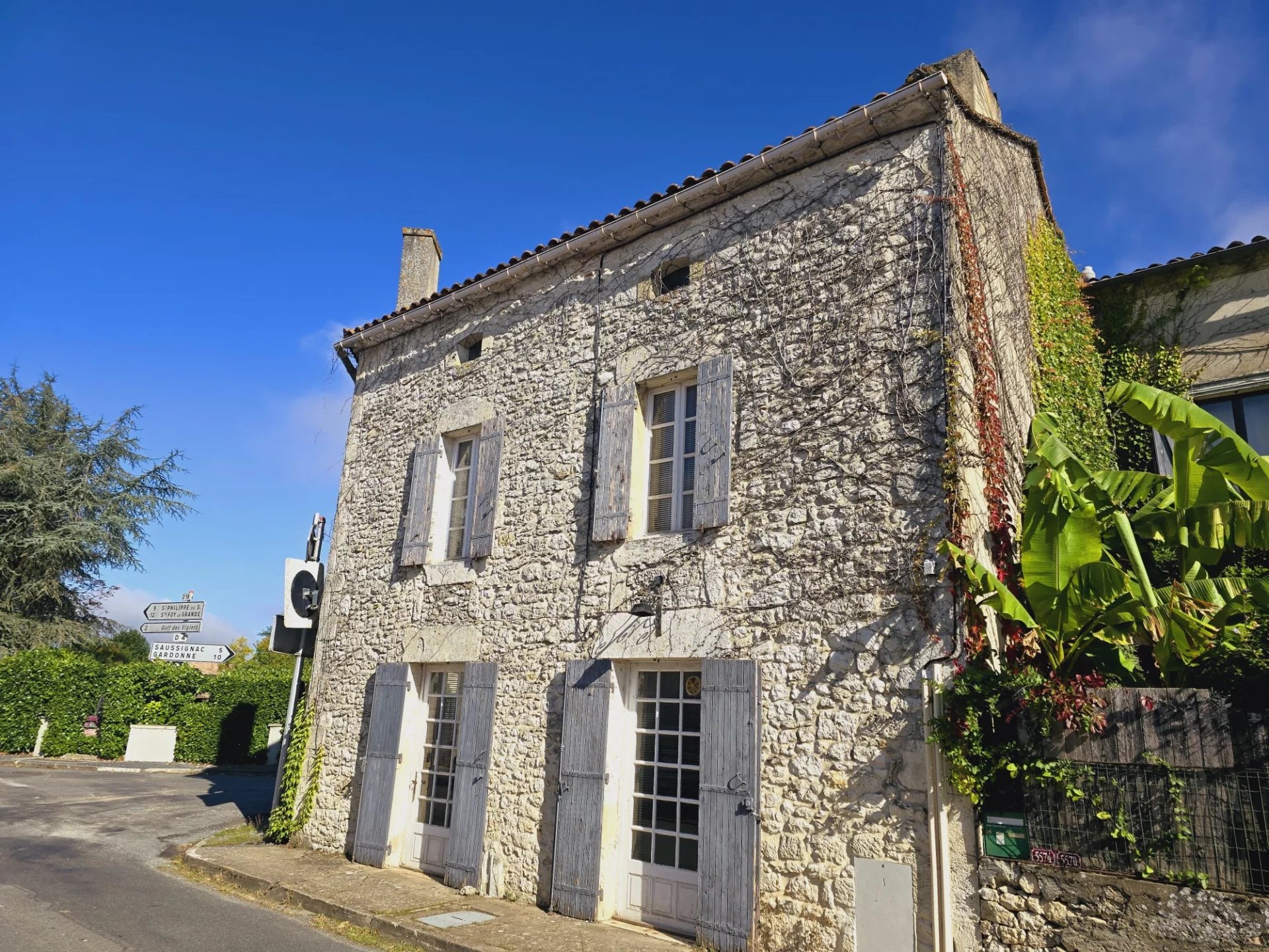 Characterful corner village house with garden and garage