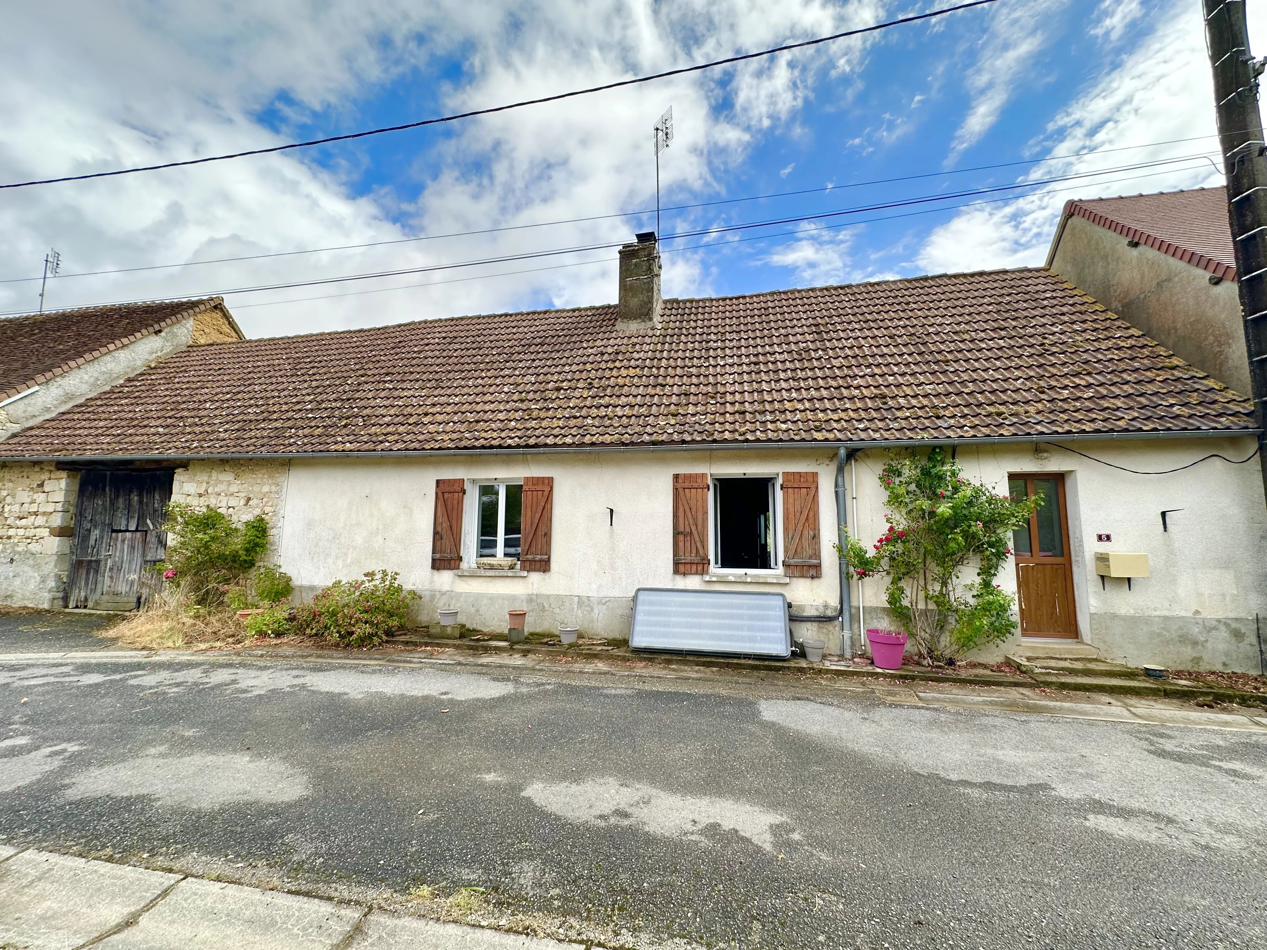 Charming Stone House with Land and Outbuildings near Coulonges