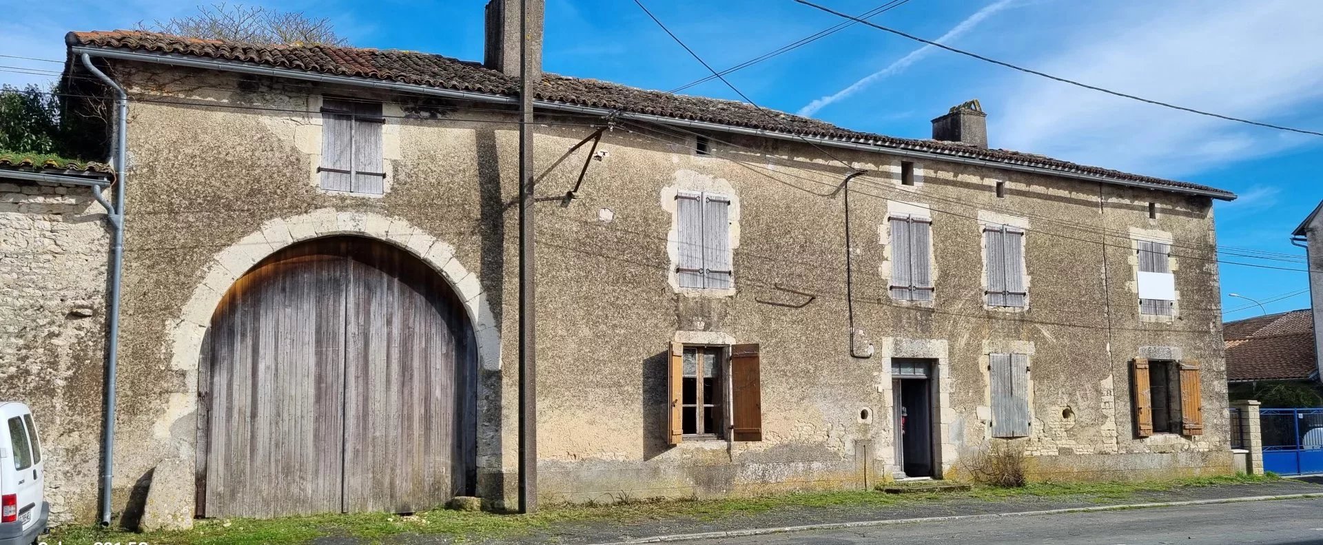 Village house to renovate with land and outbuildings