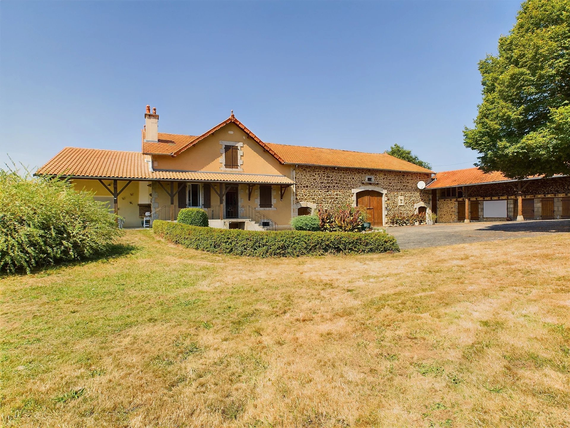 Pretty farmhouse with outbuildings and pond