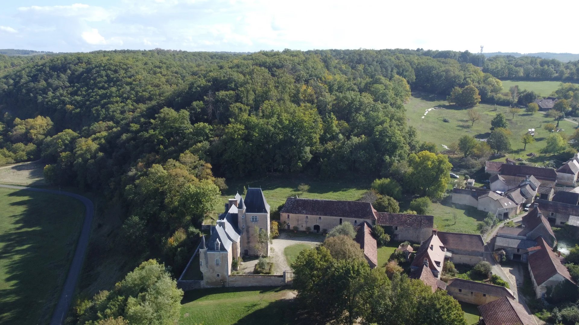 Magnificent 16th century chateau for sale with barn, stables and woods