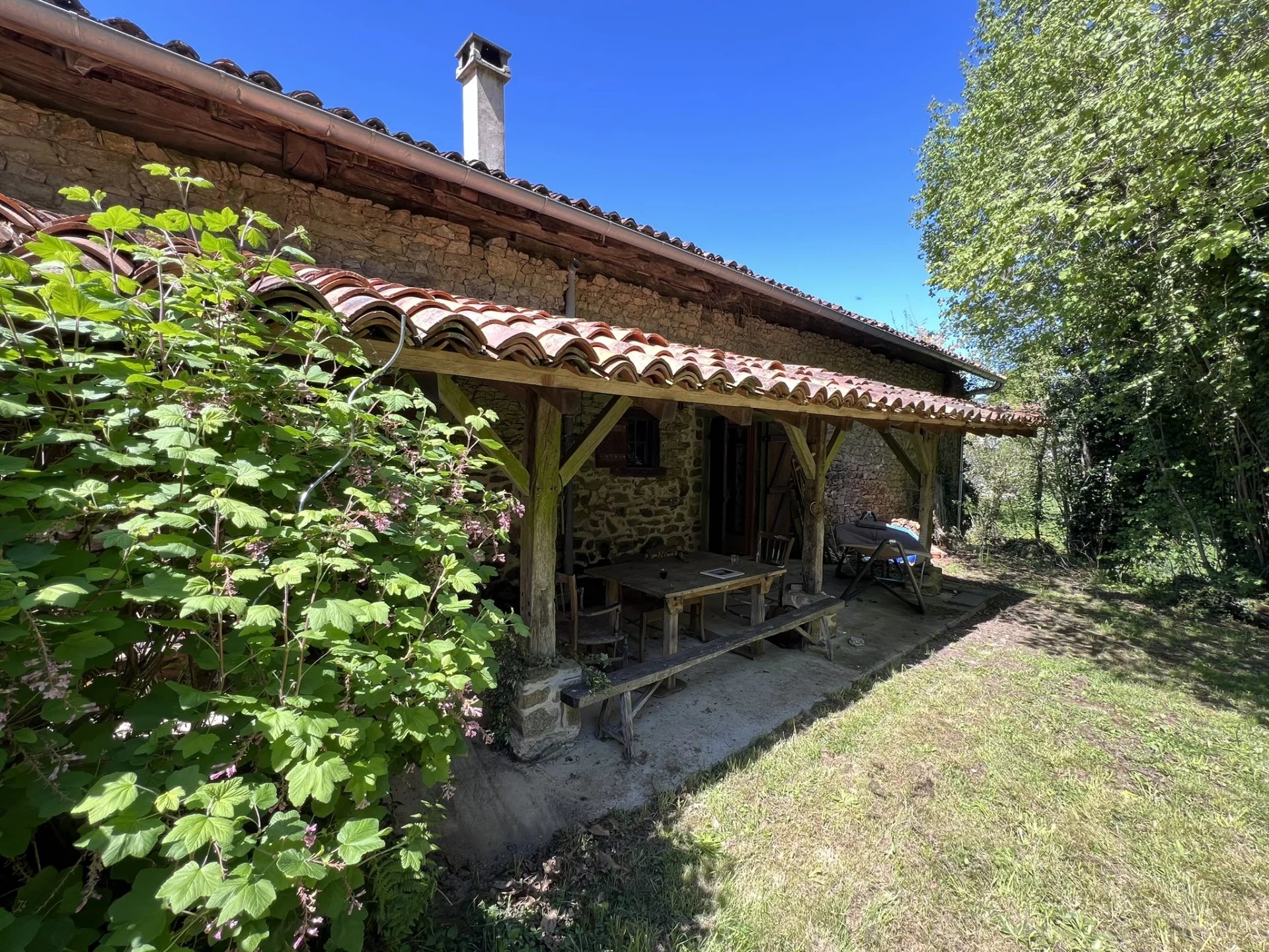 Barn conversion with pretty gardens and a covered terrace