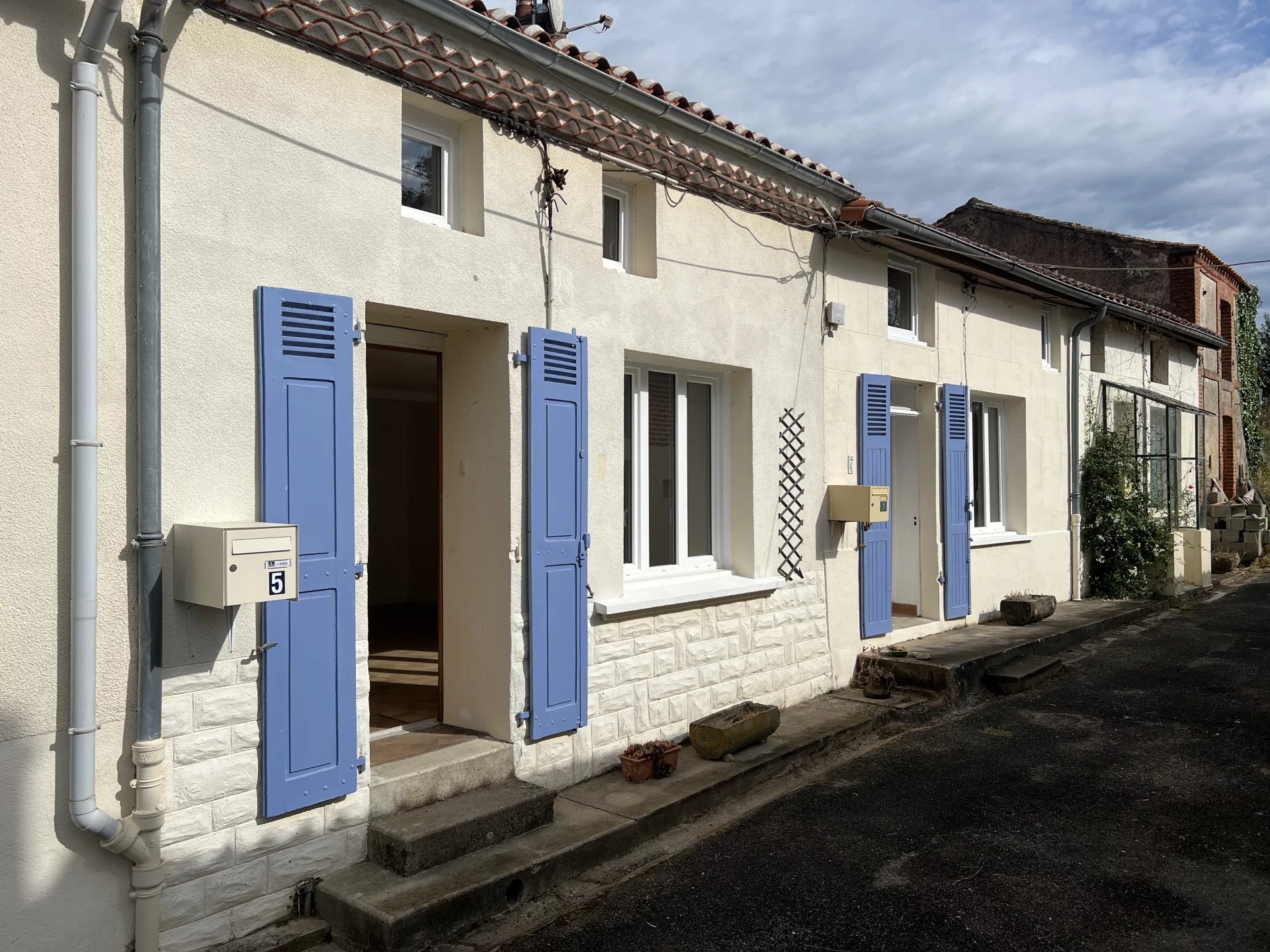 Two delightful renovated houses close to main town with income potential