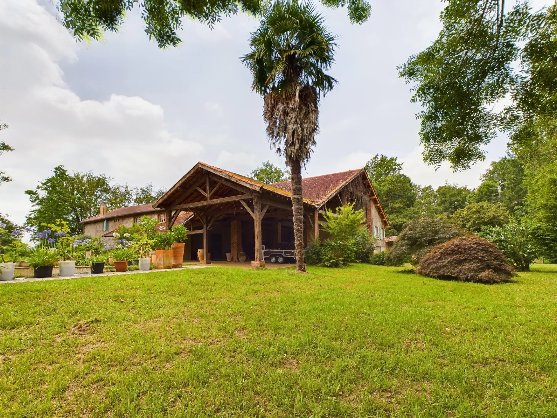 Exceptional Estate with Private River Access and Over 6 Hectares of Wooded Land