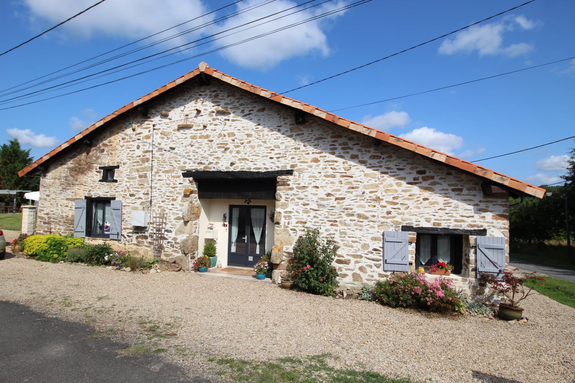 Three bedroom stone house with large barn