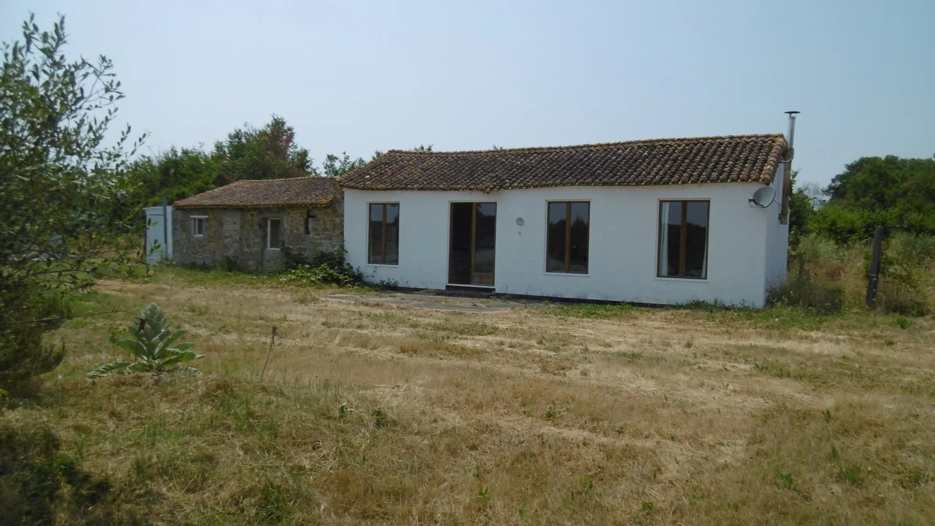 Detached property overlooking lake