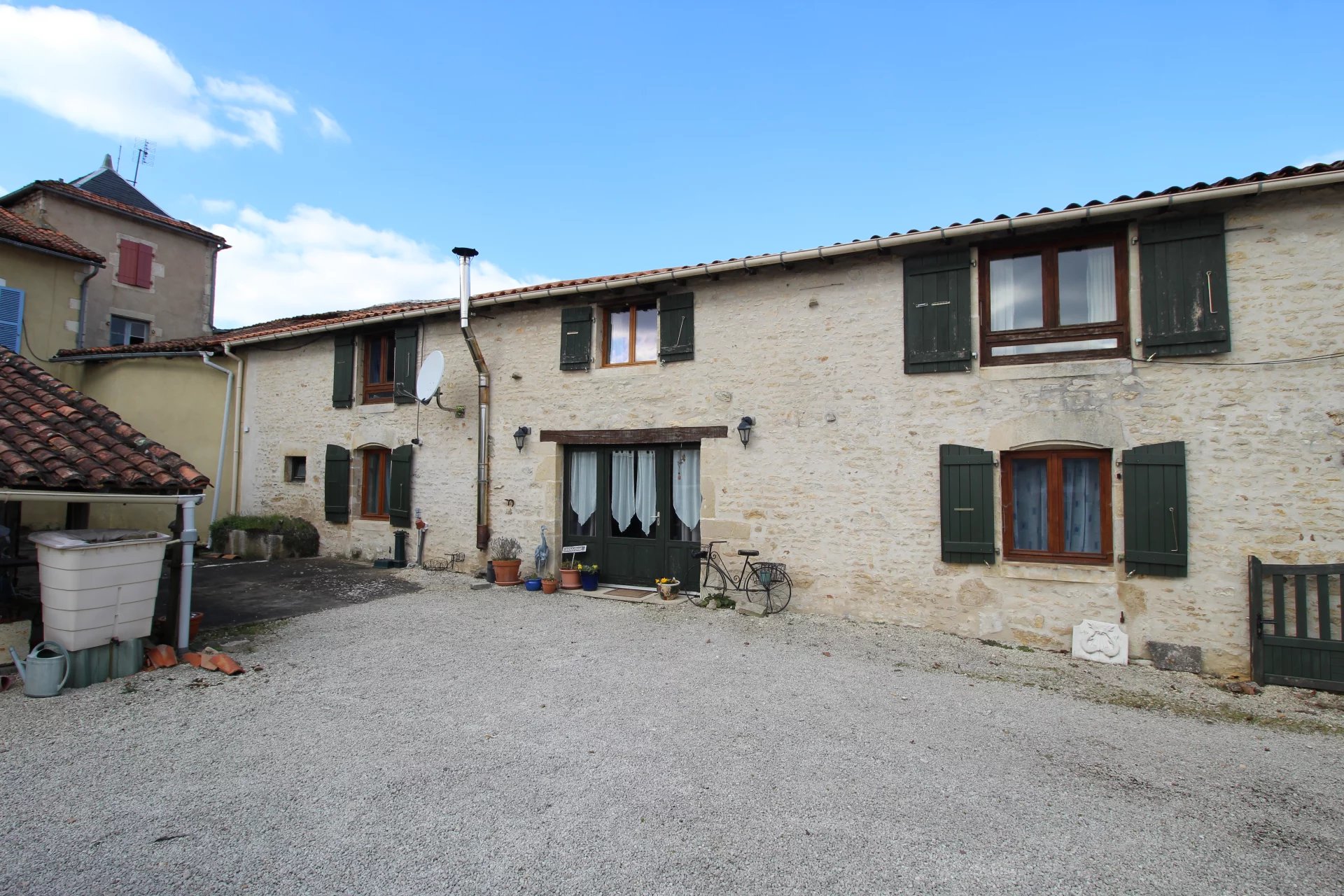 Two village houses with barn