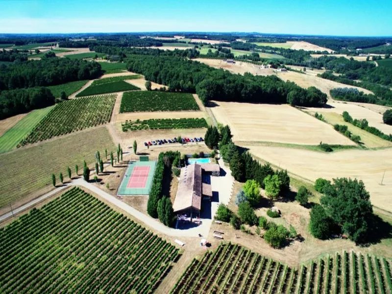 Stunning location for this working vineyard with family home, gite, pool and tennis court!