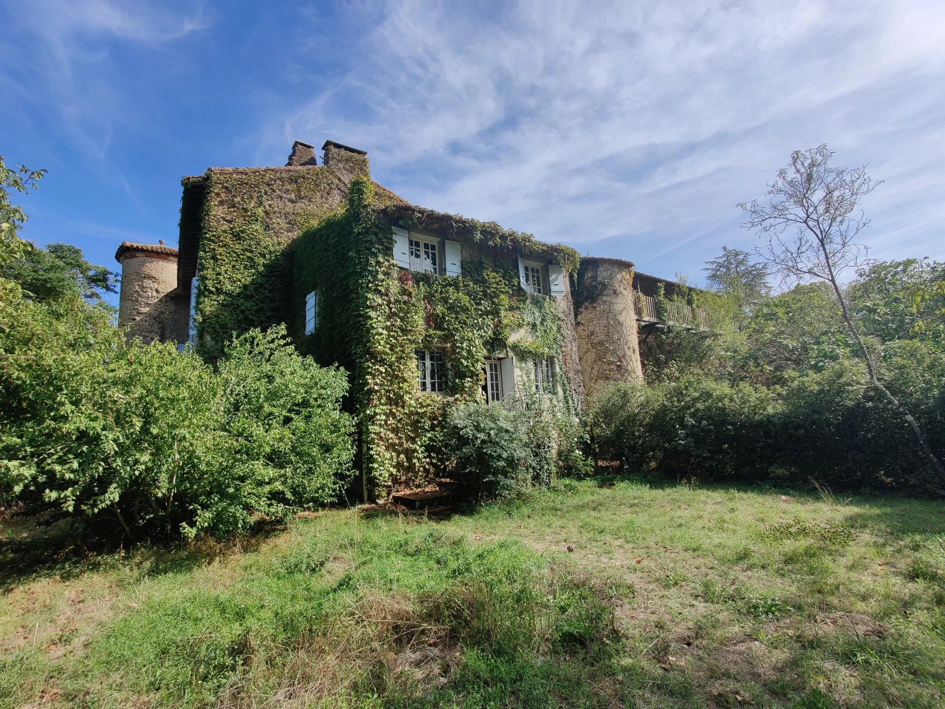 16th Century Chateau with outbuildings and pool, set in 3 ha of land including a wood, and river
