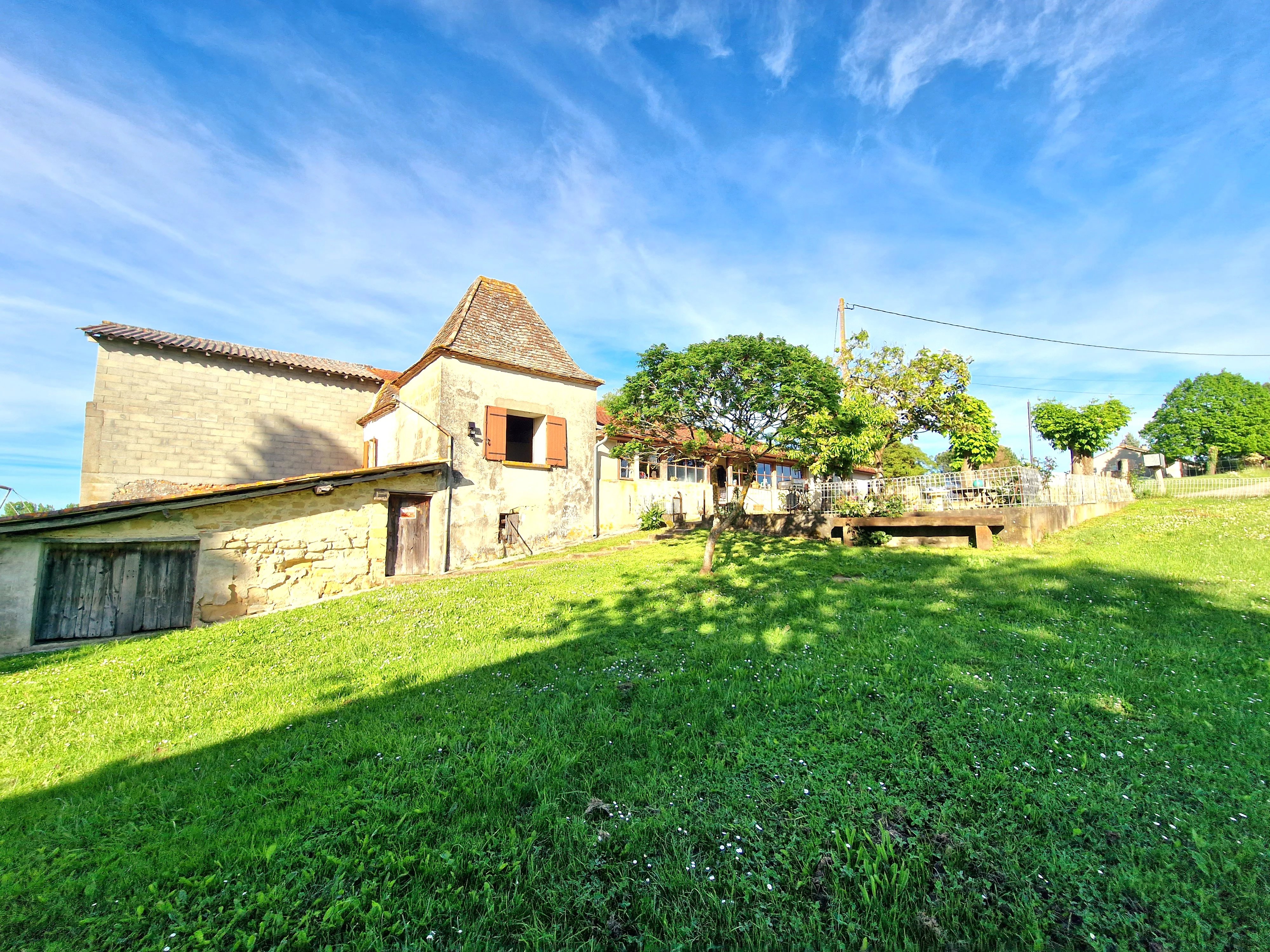 3 bedroom stone house with attached barn and land