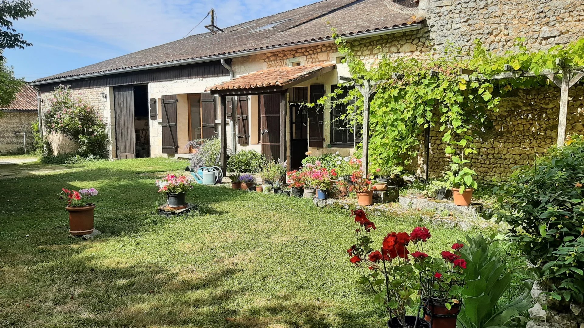 Character stone house with large barn and pretty garden