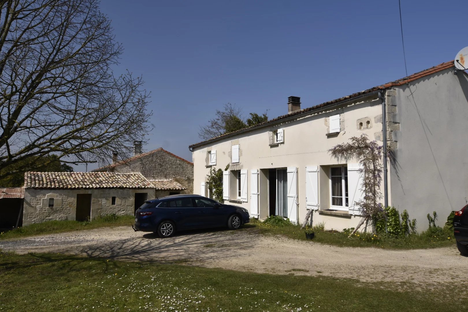 Traditional village house with large gardens and income potential