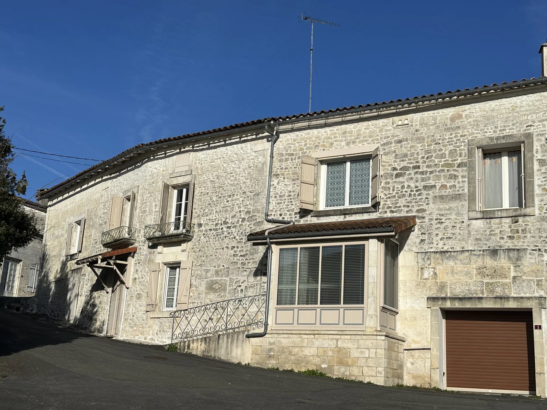 Deceptively spacious stone house overlooking the river