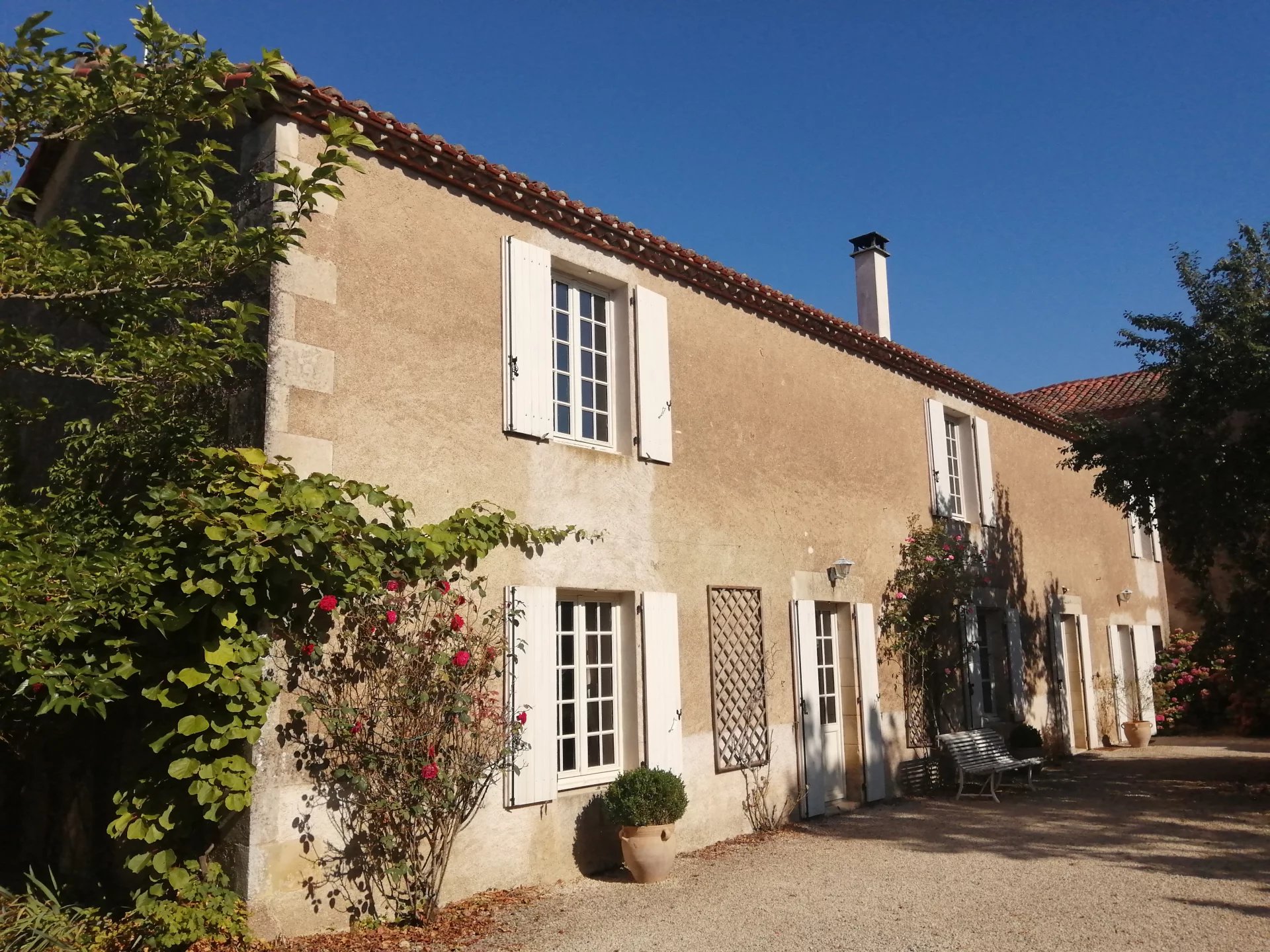 Large character stone house in the heart of a village