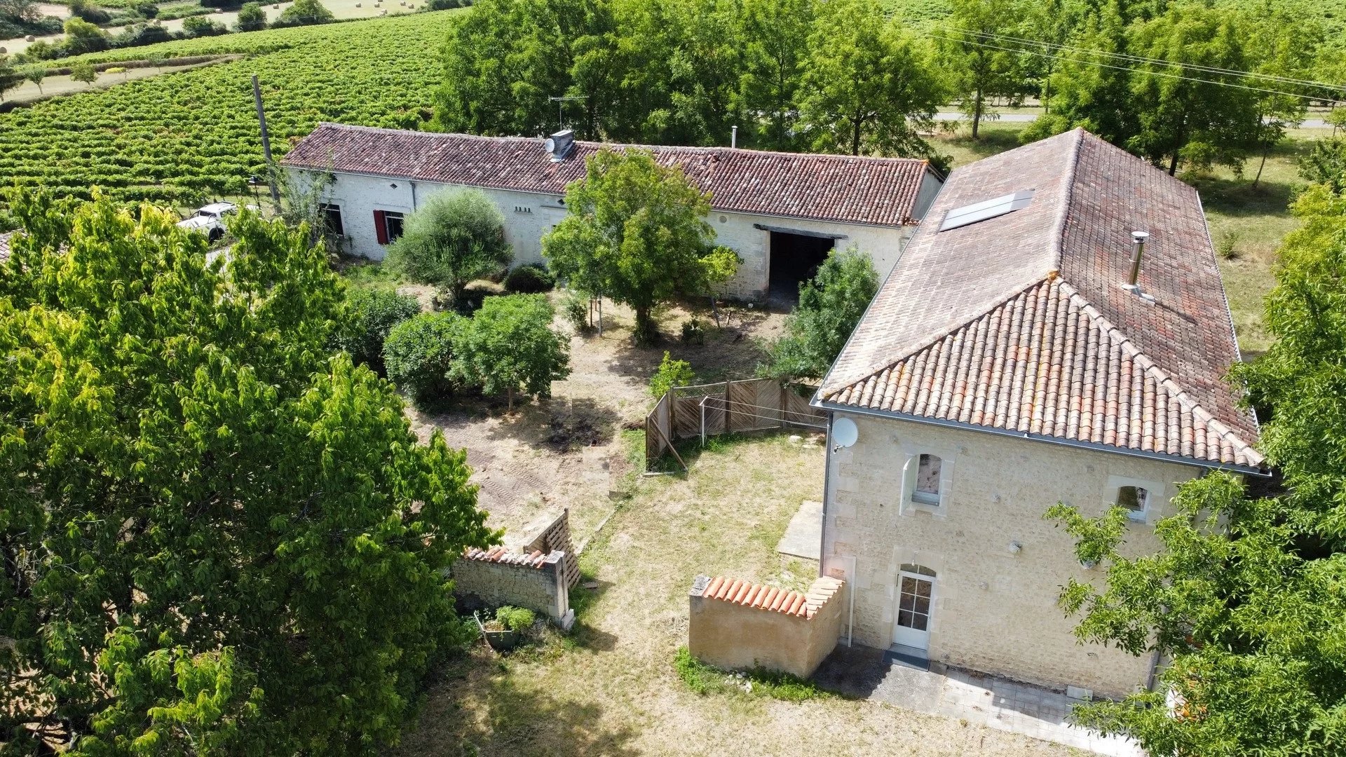 Farmhouse with two dwellings and outbuildings set in over one hectare of land