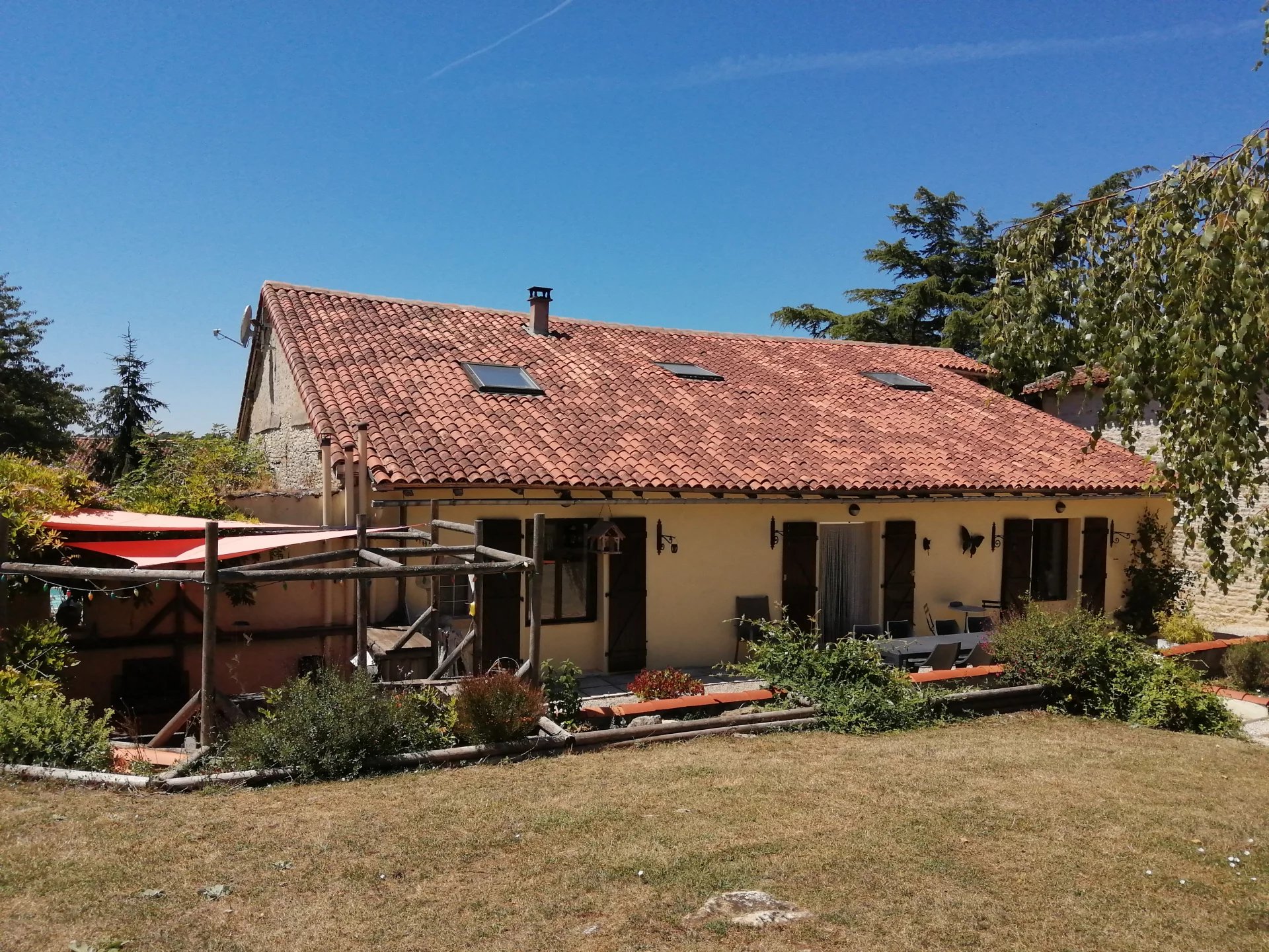 Detached stone house with land