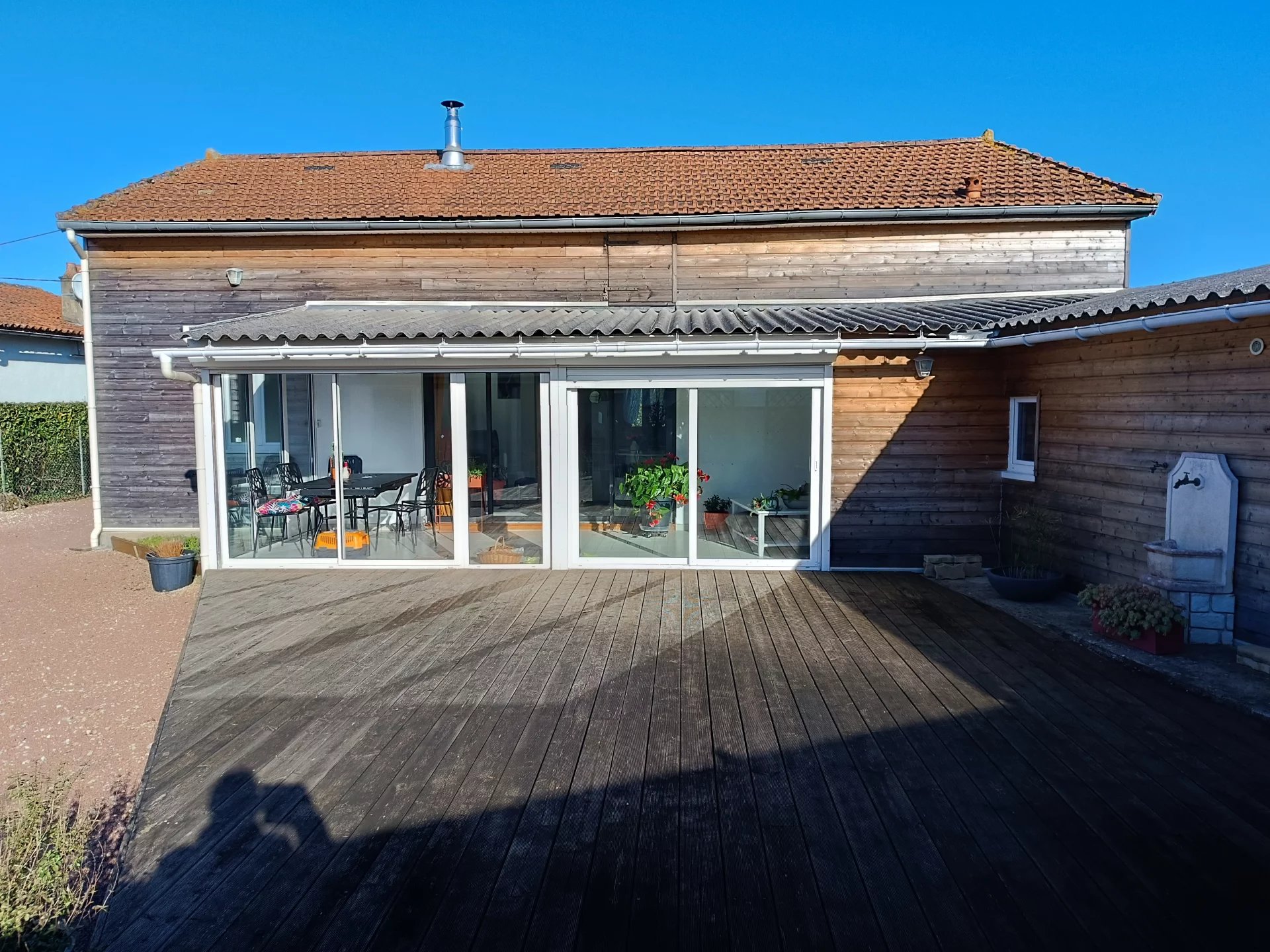 Two-bedroom bungalow with veranda, garden and outbuildings