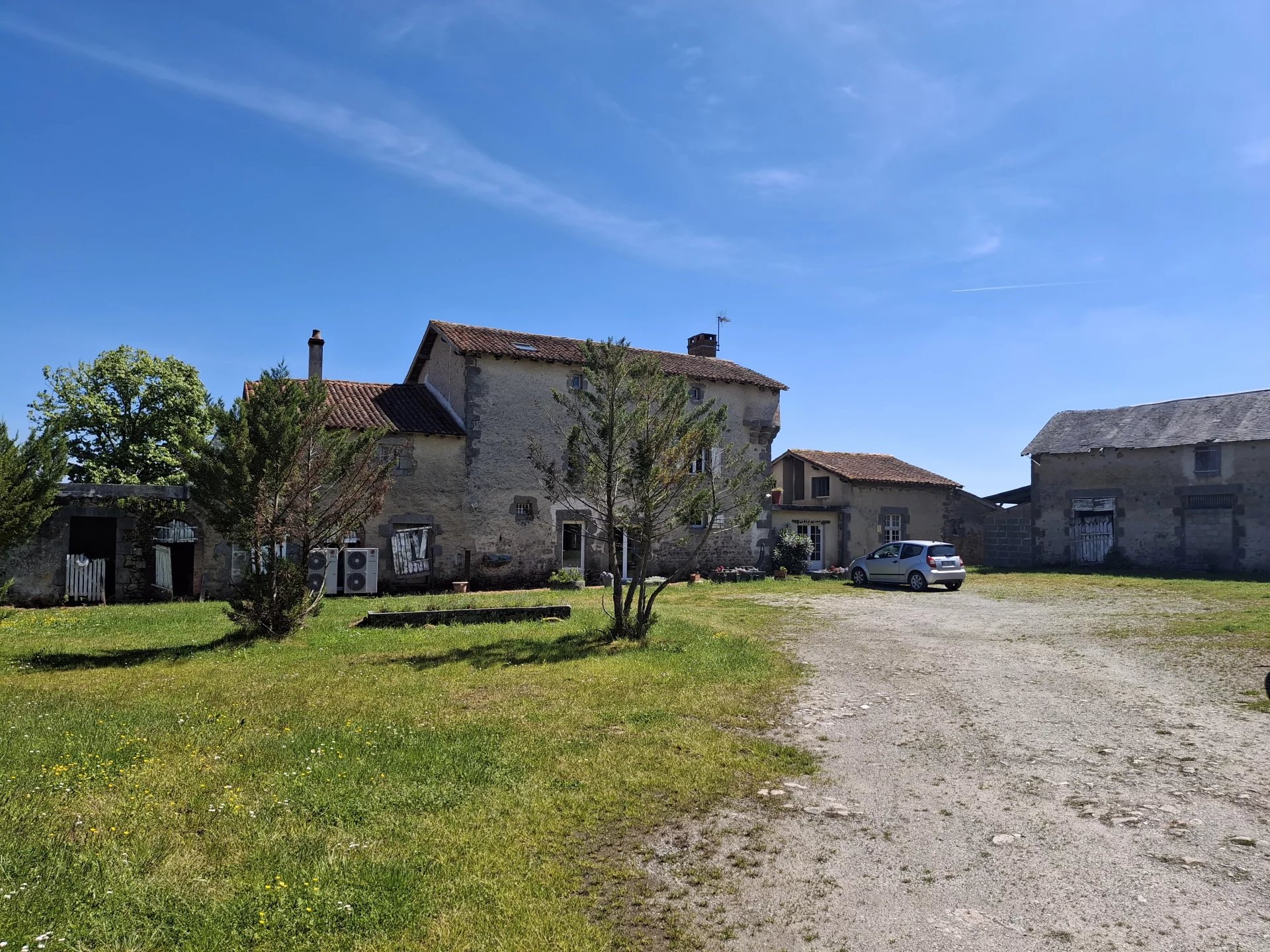 Characterful stone built farmhouse, second house to renovate, several outbuildings set in 27 hectares of beautiful Limousin farmland