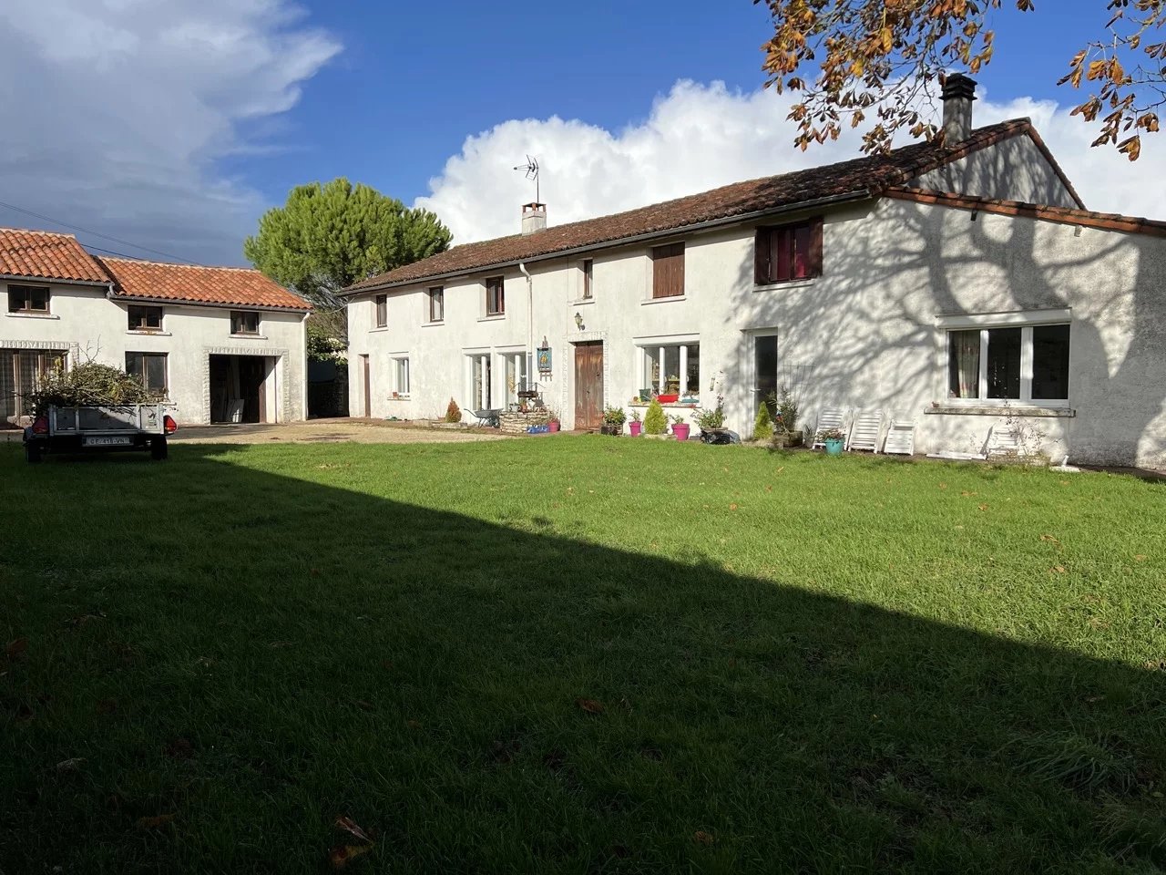 Old farmhouse and second house with large garden