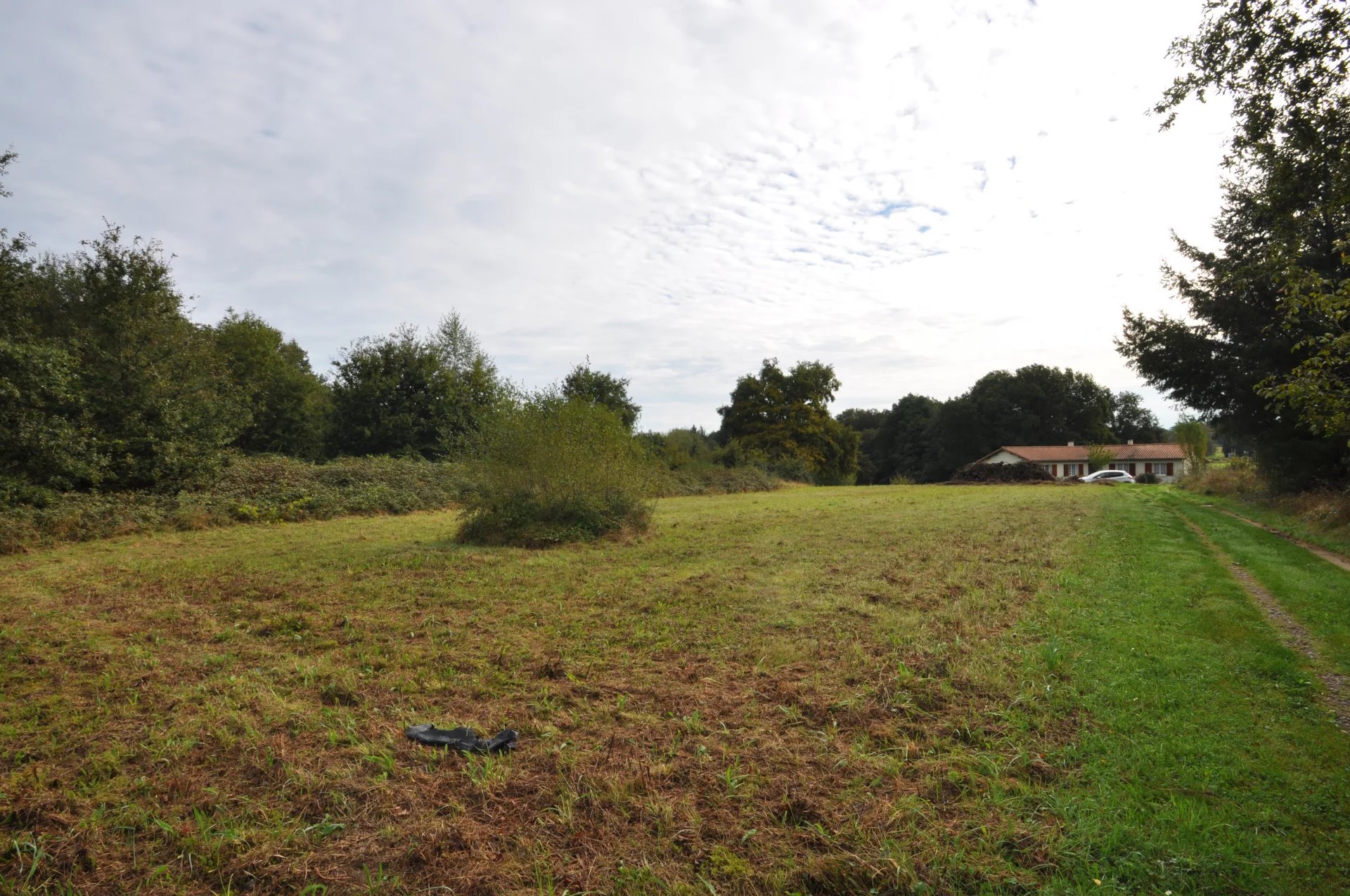 Building land for sale on the edge of a calm village