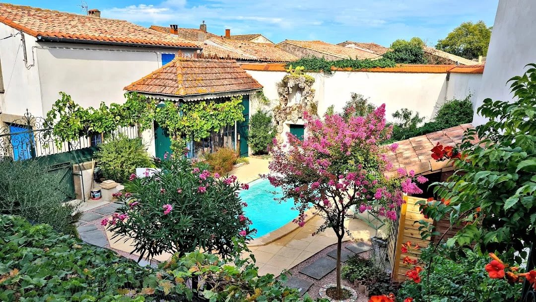 A stone property with secured garden and heated pool