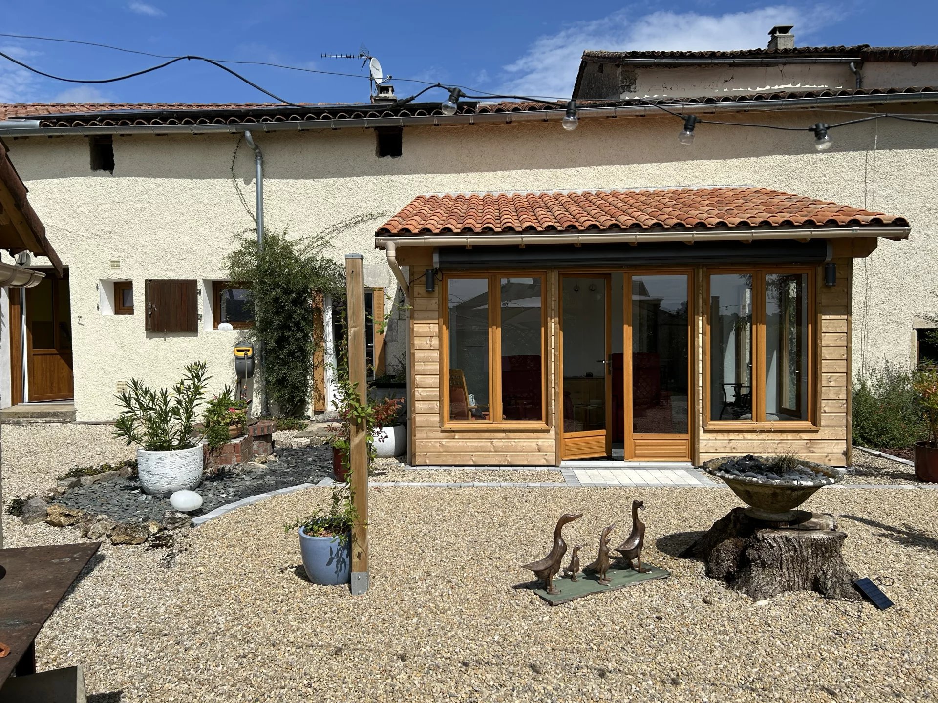 Maison de ville avec garage et jardin