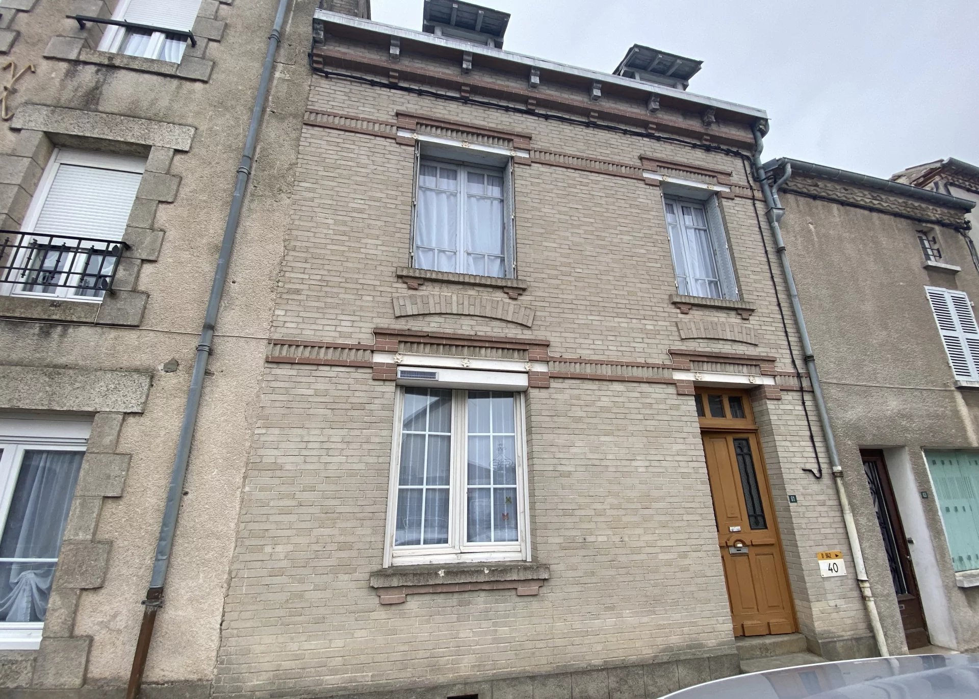 Terrace house in the centre of lively town, garage and barn